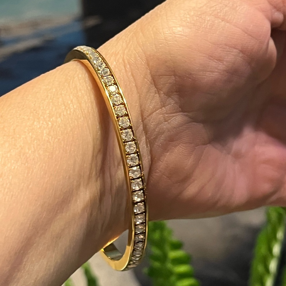 # 705-Elegant, sturdy, silver rhinestone on gold Women's Bracelet